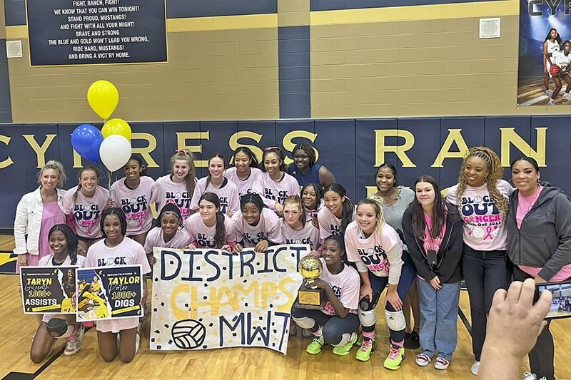 The Cypress Ranch High School volleyball team poses after claiming the District 16-6A championship. 